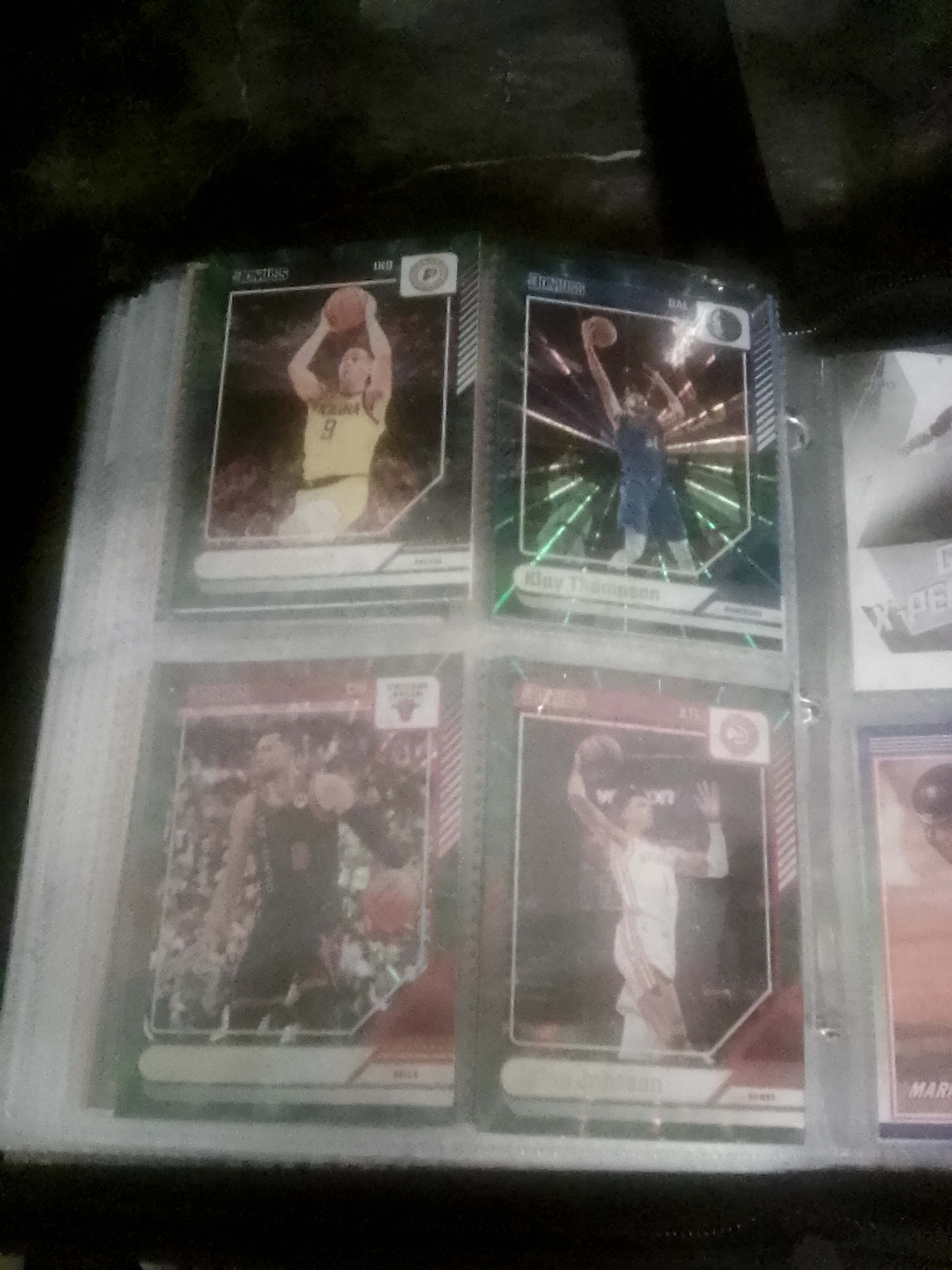 sport binder with Pokemon trading cards, baseball, football & basketball cards
